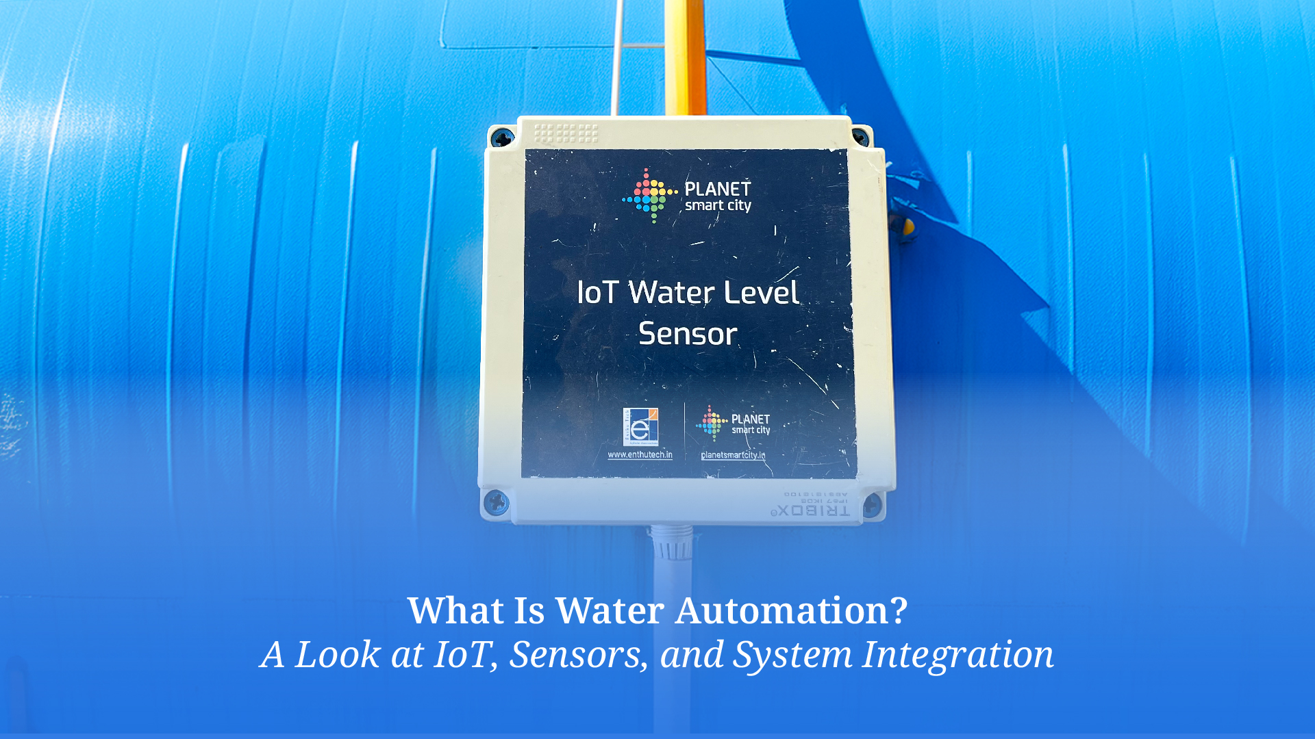 IoT water level sensor mounted on a blue storage tank, illustrating smart water automation and sensor-based monitoring systems